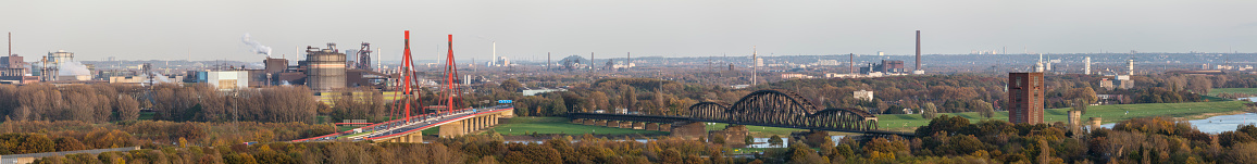 Panoramic view over Rhine river to the industrial north of Duisburg, Germany.