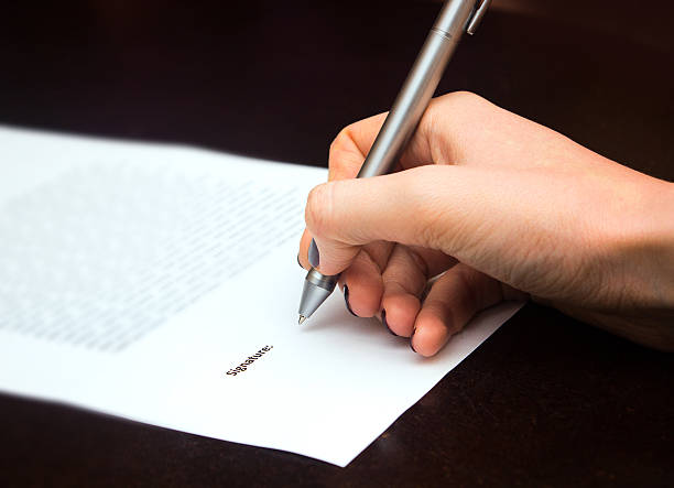 istock Business worker signing the contract 530828687