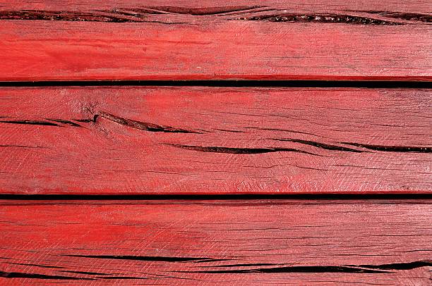 istock Red cracked wooden boarding 530829475