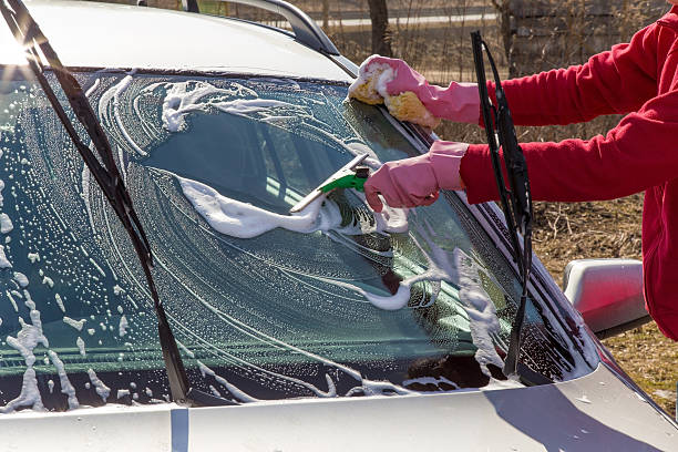 istock Professional car wash by hands. Early spring washing. 530830934