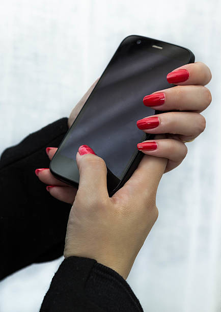 istock woman holding a smartphone 530831527