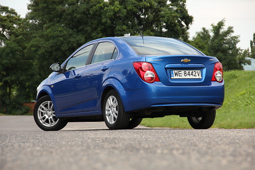Warsaw, Poland - July, 29th, 2011: Test drive of a Chevrolet Aveo. The second geneneration of Aveo was debut in 2011 on the market. Sedan from Chevrolet is powered by 1.2 to 1.6 -litre petrol engines (pushing out 70 HP to 115 HP) or diesel engine 1.3-litre (75 HP). The Aveo is the one of the cheapest family sedan on the market.