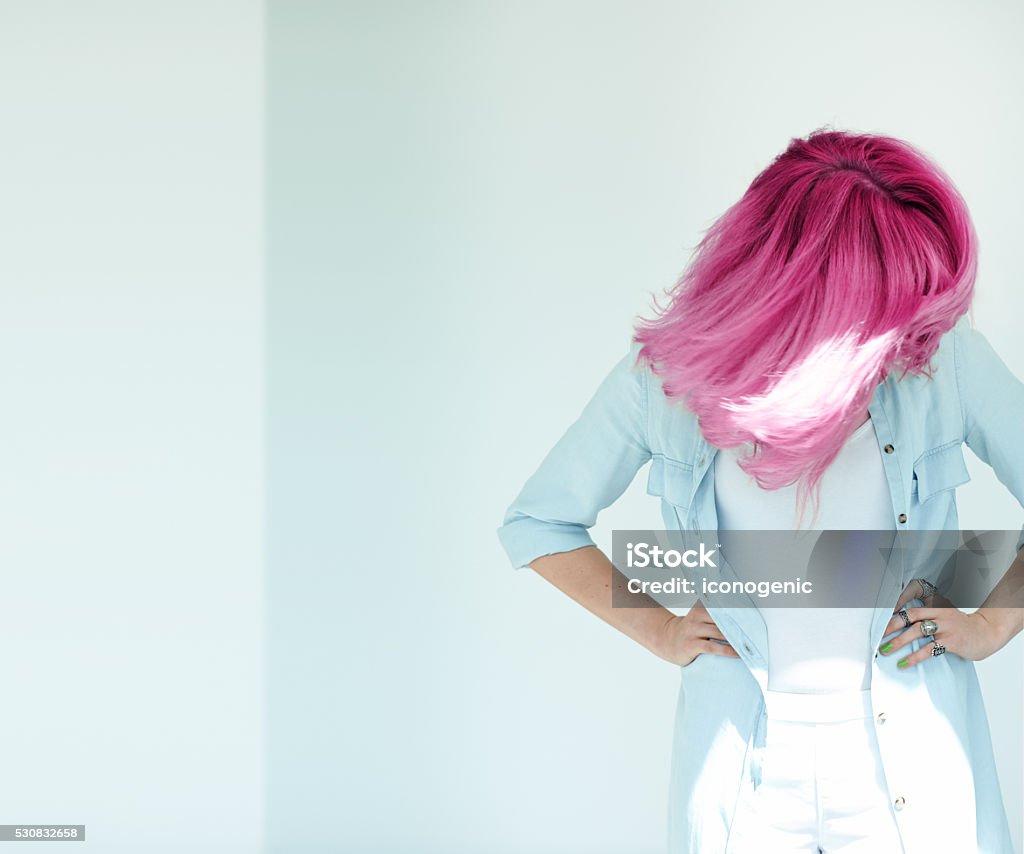 Motion Shot Of Dyed Hair Motion shot of woman's hair. Dyed hair in daylight concept. Beautiful woman with copyspace. Fashion Stock Photo