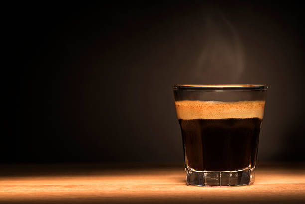 Espresso coffee on a wooden table