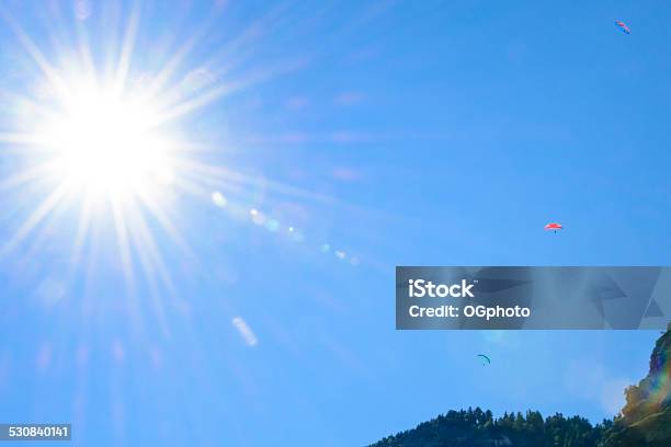 Paragliding With Bright Sun Stock Photo - Download Image Now - 2015, Adventure, Back Lit