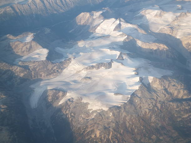 istock Aerial view of snow covered mountains 530841325