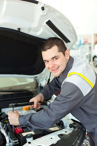 istock Auto mechanic with wrench 530842759
