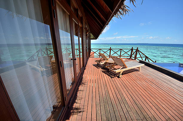 istock Empty tanning beds on the overwater bungalow balcony 530851877