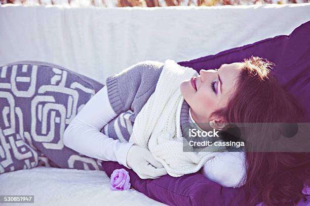 Woman Lying On Sofa Outdoors In Sunny Day Stock Photo - Download Image Now - Dress, Happiness, One Woman Only