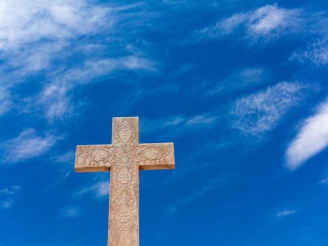 A crucifix on a grave.