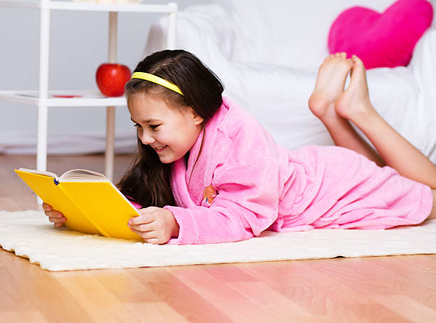 istock Girl is reading a book 530852317