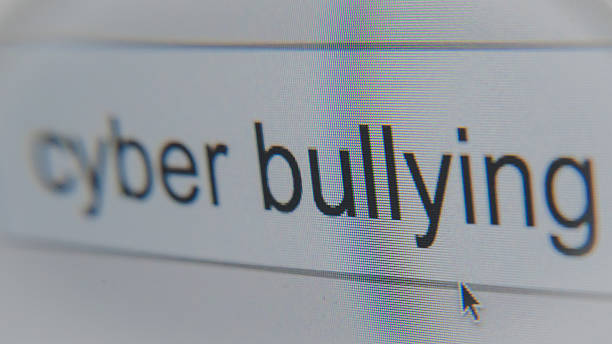 istock cyber bullying - word search bar close up marco 530855317