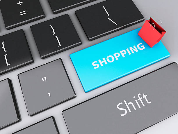 istock Shopping bag on computer keyboard. Online shopping concept. 530856131