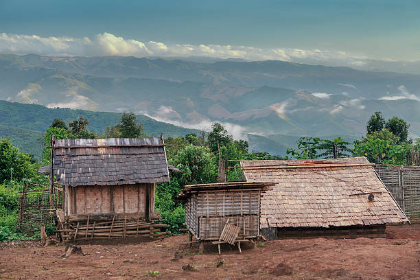 istock akha village in the mist 530856219