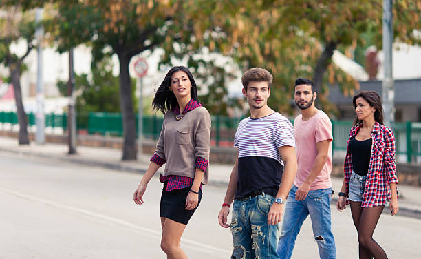 istock Friends walking in the city 530857197