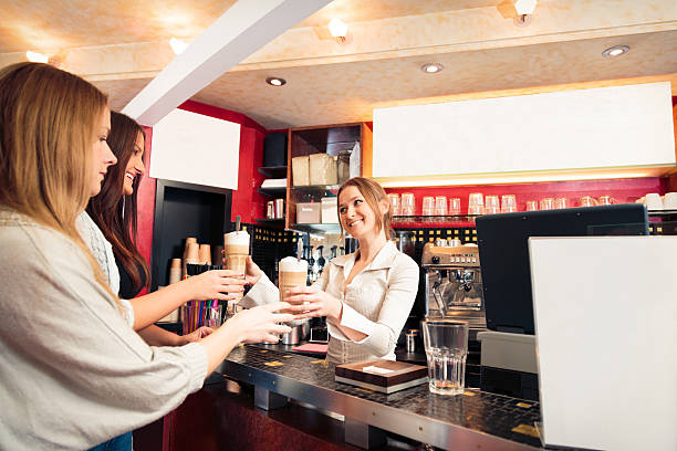 istock friends getting a cup of coffee 530862933