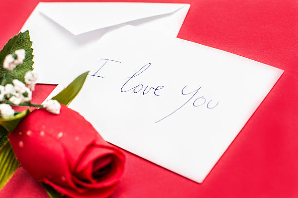 istock Rose and note saying I love you 530863003