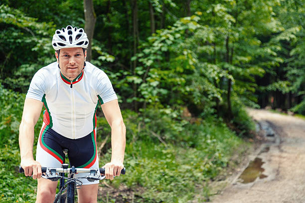 istock young man riding his mountain bike 530863423