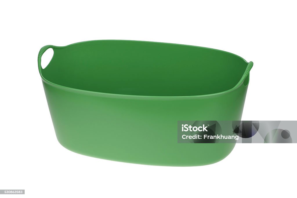 Green plastic basket for laundry 2015 Stock Photo