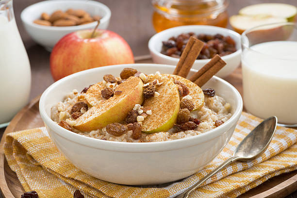istock oatmeal with apples, raisins, cinnamon and ingredients 530864755