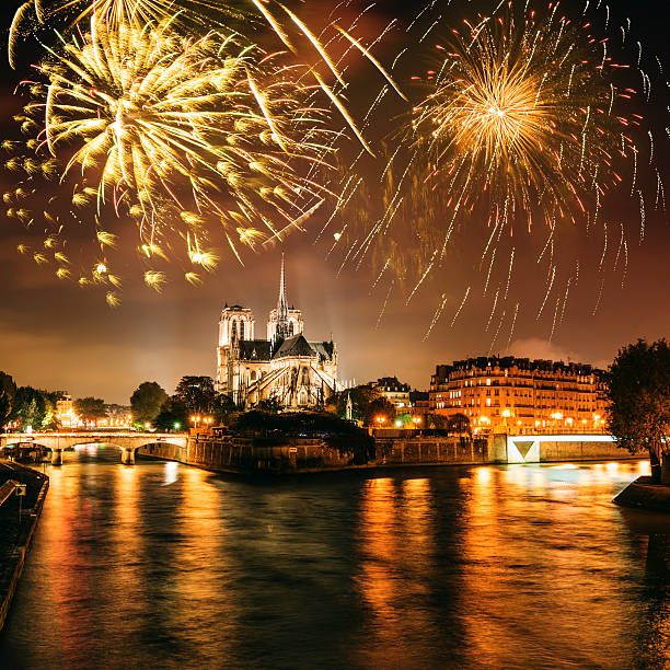 istock Notre Dame de paris in night with fireworks 530870525