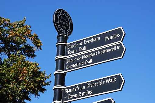 Wrought iron tourist attraction signpost, Evesham, Worcestershire, England, UK, Western Europe.