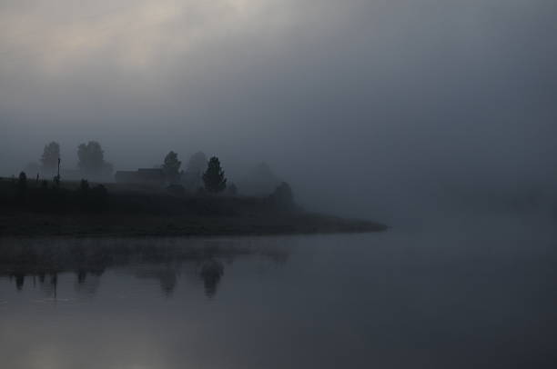 istock Foggy sunrise at Suhona river 530871435