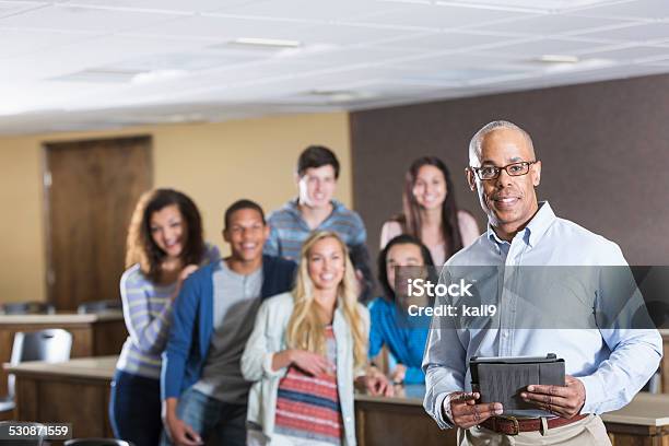 Instructor In Classroom Stock Photo - Download Image Now - Professor, Teacher, African Ethnicity