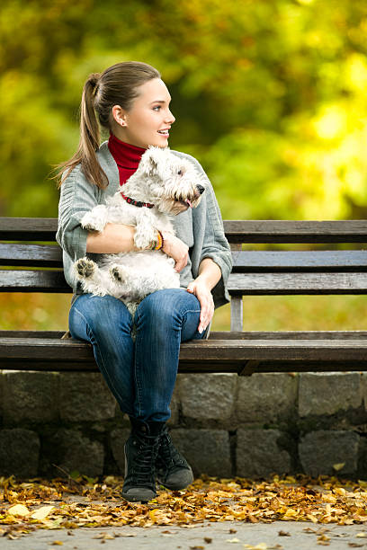 istock Young woman with a maltese dog 530873579