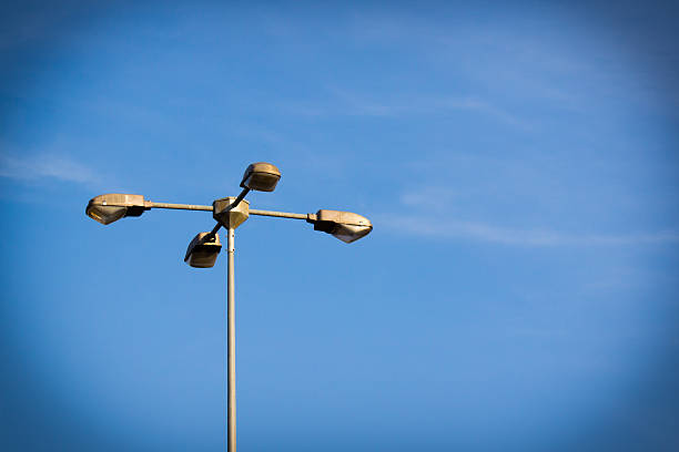 istock Street lamps on blue sky 530873647