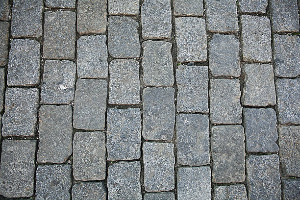 istock stones paving the old texture background 530874091