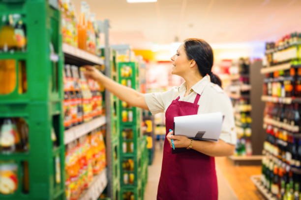 istock sales clerk at the supermarket 530876171