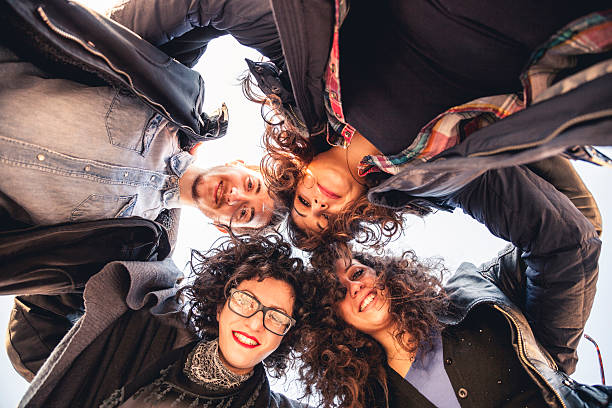 istock Group of friends embraced 530876545