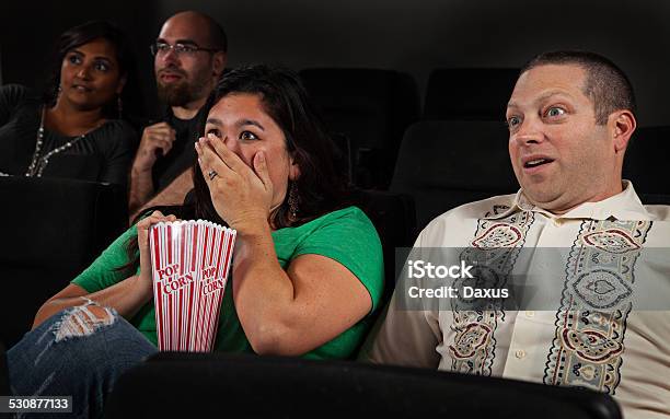 Scared People In A Movie Theater Stock Photo - Download Image Now - 20-29 Years, 2015, 30-39 Years