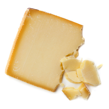 Gruyere cheese, isolated on white background.