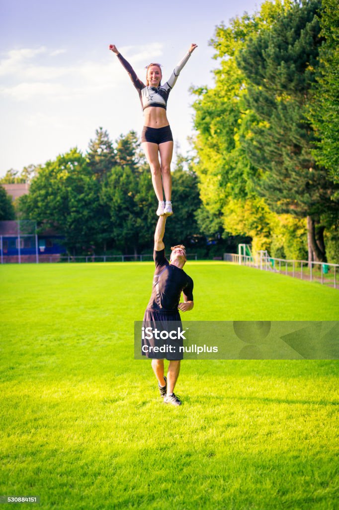 Cheerleaders Formation on the Grass Editorial Stock Image - Image of happy,  background: 129081264