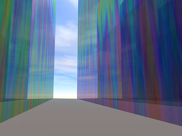 Colorful glass towers with a blue sky background.