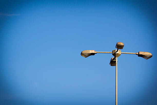 istock Street lamps on blue sky 530885863