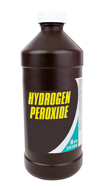 Bottle of Hydrogen Peroxide Generic brown plastic bottle of hydrogen peroxide antiseptic. Vertical. hydrogen peroxide stock pictures, royalty-free photos & images