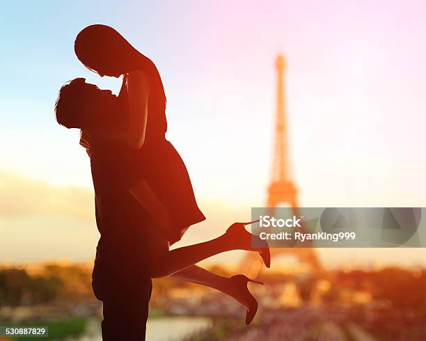 Romantic Lovers With Eiffel Tower Stock Photo - Download Image Now - Paris - France, Couple - Relationship, Valentine's Day - Holiday