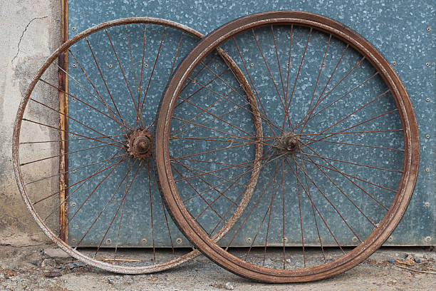 istock Old oxidized and damaged bicycle wheels 530890959