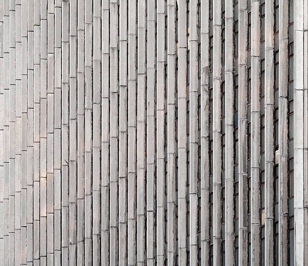 istock Concrete wall with vertical lines and windows 530902067
