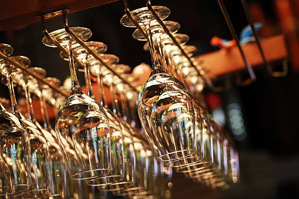 istock Many empty glasses for a wine hanging in a bar 530903427