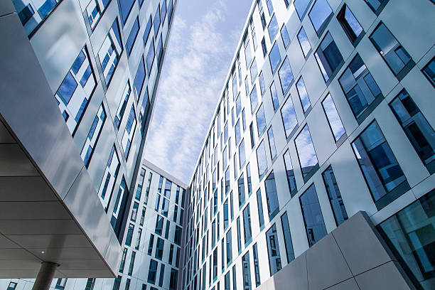 istock Abstract facade lines and glass reflection on modern building 530904665
