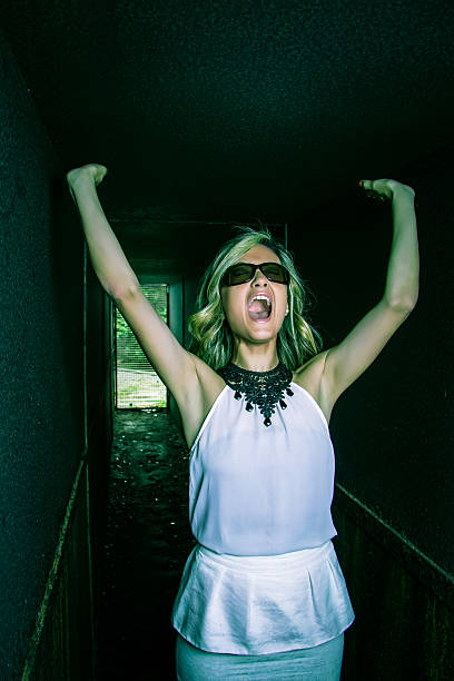 istock Scared young girl screaming alone inside of a dark tunnel 530905329