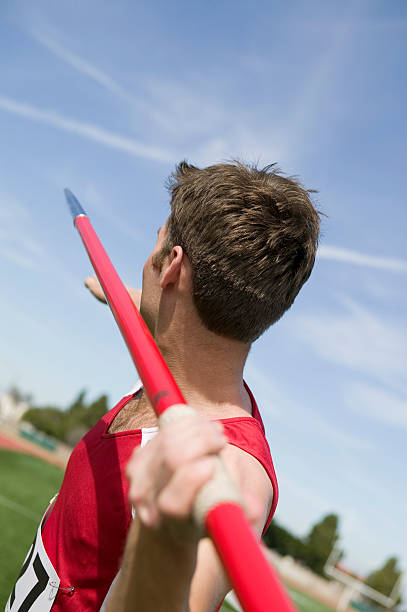 istock Male athlete holding javelin 530907475