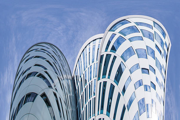 istock Abstract facade lines and glass reflection on modern building. 530917641