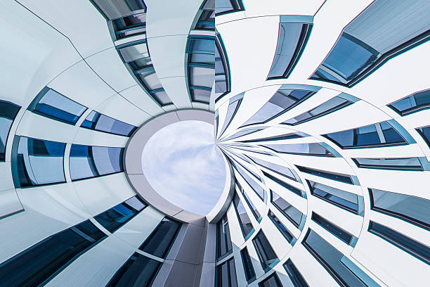istock Abstract facade lines and glass reflection on modern building. 530917651