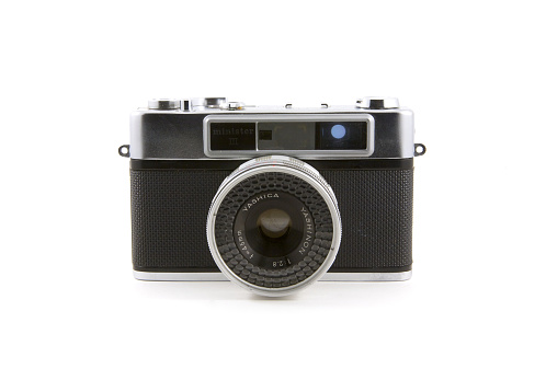 Vancouver, Canada - January 2, 2015: A vintage Yashica Minister III camera isolated on white background. Yashica was a Japanese manufacturer of cameras created in 1949. 