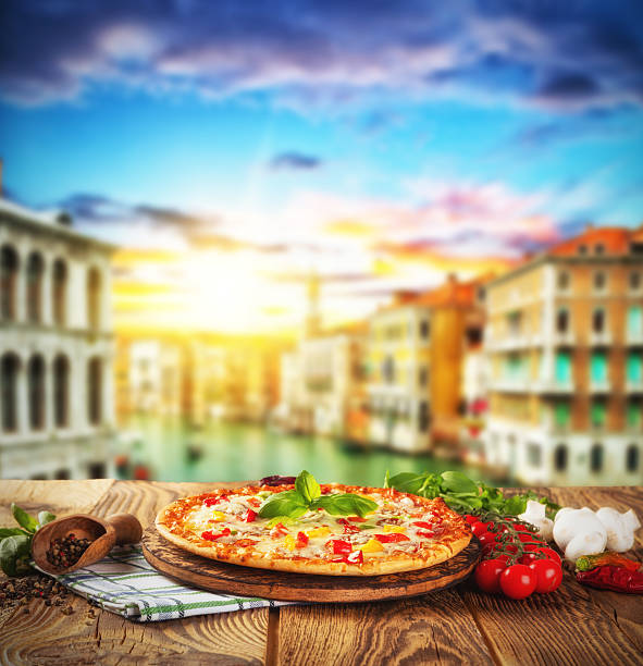Rustic pizza with old city Italy background
